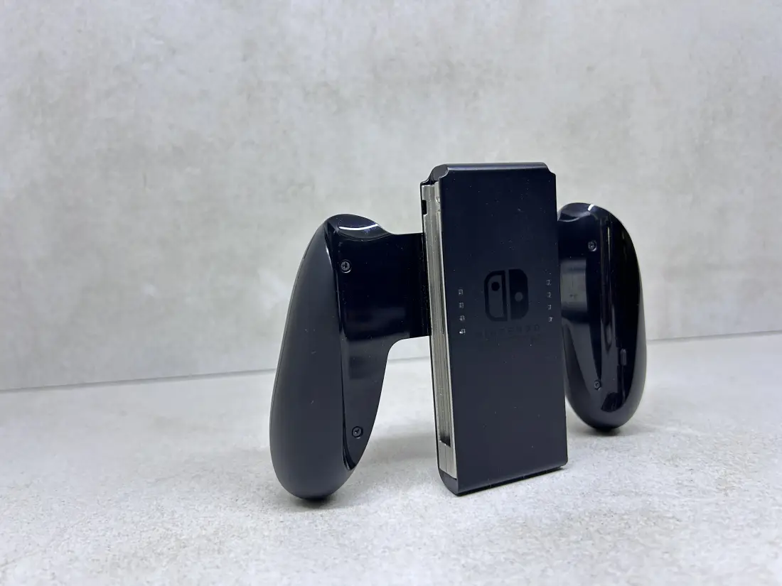 Nintendo Switch > Grip ili Drzac za Joy-Con / ORIGINAL