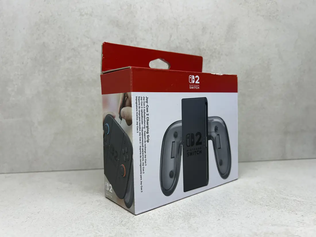 Nintendo Switch 2 > Charging Grip za Joy-Con + Drzac