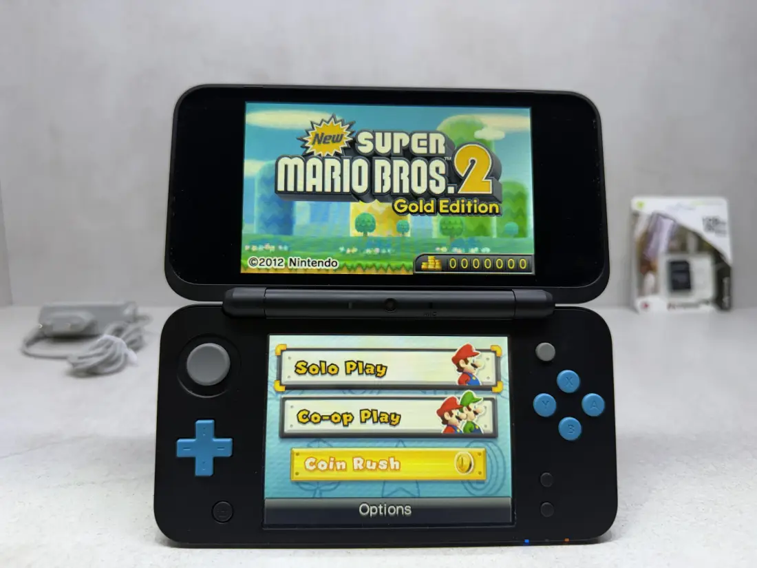 Nintendo New 2DS XL > 128gb / 1361 igra / + Emulatori