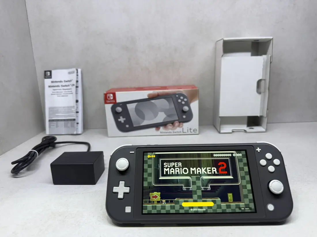 Nintendo Switch Lite > 544gb / 60-100 igara / + Kutija